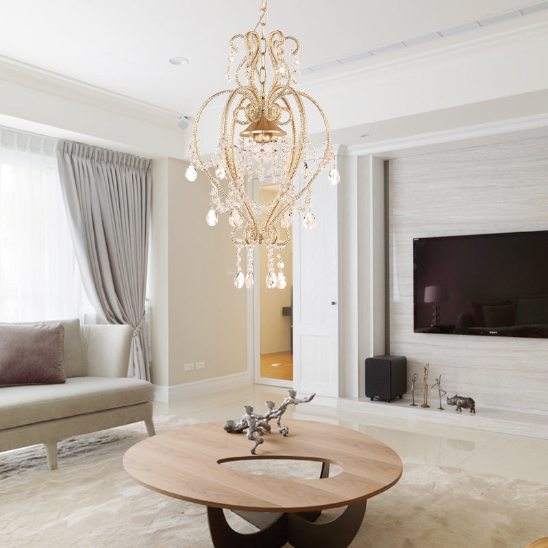 Scroll Frame Pendant Lamp Victorian Style Metallic Single Golden Ceiling Light with Dangling Crystal Accent Clearhalo 'Ceiling Lights' 'Modern Pendants' 'Modern' 'Pendant Lights' 'Pendants' Lighting' 263674