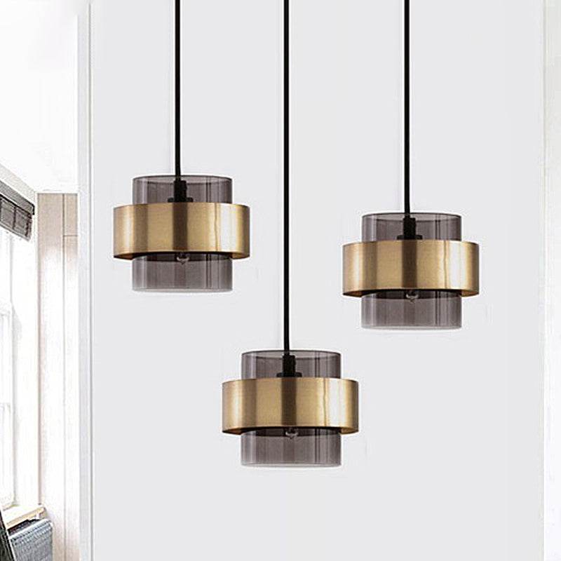 Cylinder Smoke Gray Glass Pendant Light Modern 1 Light Gold Hanging Ceiling Light Clearhalo 'Ceiling Lights' 'Glass shade' 'Glass' 'Modern Pendants' 'Modern' 'Pendant Lights' 'Pendants' Lighting' 290715