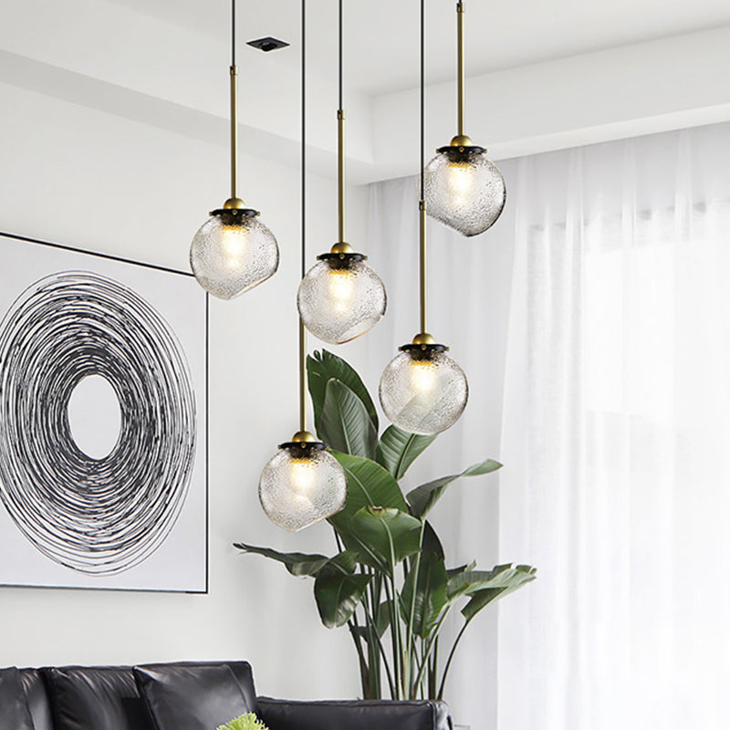 Modern 1 Bulb Hanging Light Gold Sphere Ceiling Suspension Lamp with Water Glass Shade Clearhalo 'Ceiling Lights' 'Glass shade' 'Glass' 'Modern Pendants' 'Modern' 'Pendant Lights' 'Pendants' Lighting' 302758