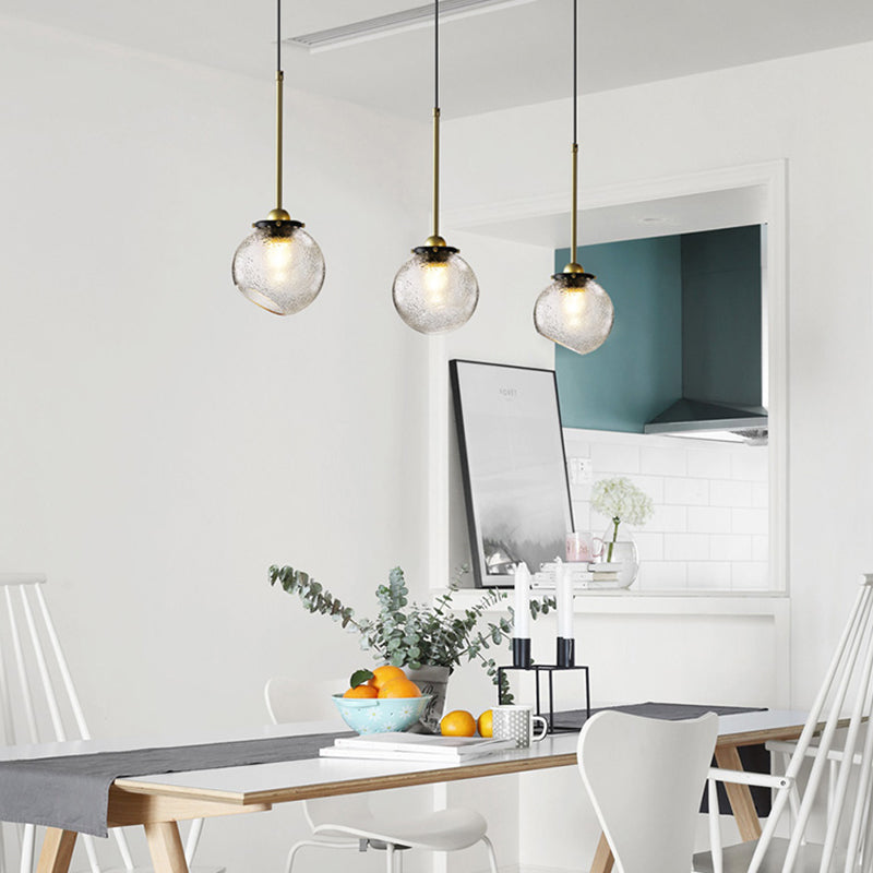 Modern 1 Bulb Hanging Light Gold Sphere Ceiling Suspension Lamp with Water Glass Shade Clearhalo 'Ceiling Lights' 'Glass shade' 'Glass' 'Modern Pendants' 'Modern' 'Pendant Lights' 'Pendants' Lighting' 302760