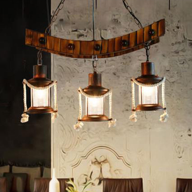 Clear Glass Dark Brown Chandelier Light Lantern 3 Lights Warehouse Hanging Ceiling Fixture for Kitchen Dark Brown Clearhalo 'Ceiling Lights' 'Chandeliers' 'Glass shade' 'Glass' 'Industrial Chandeliers' 'Industrial' 'Middle Century Chandeliers' 'Tiffany' Lighting' 326691