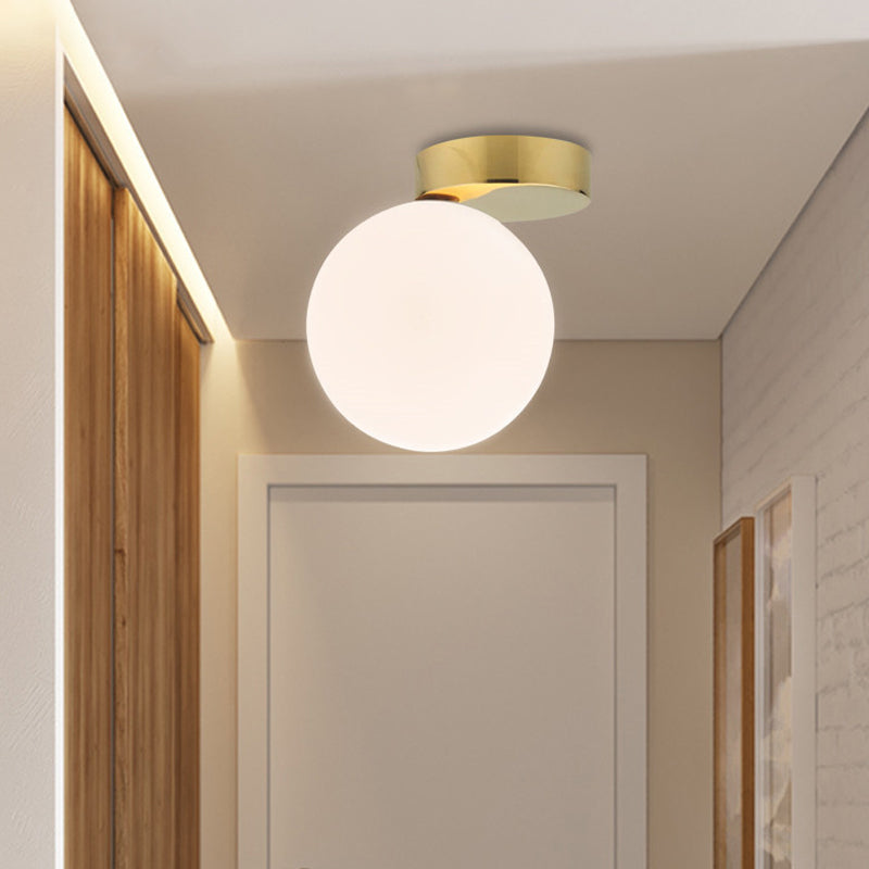 White Glass Globe Ceiling Light Fixture Nordic 1 Bulb Flush Mount Lighting in Gold Finish White A Clearhalo 'Ceiling Lights' 'Close To Ceiling Lights' 'Close to ceiling' 'Flush mount' Lighting' 330621