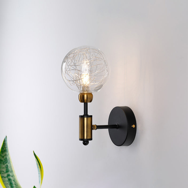 1/2-Light Bedroom Sconce Wall Light Industrial Style Black/Brass Finish Wall Lamp with Orbit Clear Glass Shade 1.0 Black Clearhalo 'Art deco wall lights' 'Cast Iron' 'Glass' 'Industrial wall lights' 'Industrial' 'Middle century wall lights' 'Modern' 'Rustic wall lights' 'Tiffany' 'Traditional wall lights' 'Wall Lamps & Sconces' 'Wall Lights' Lighting' 331670