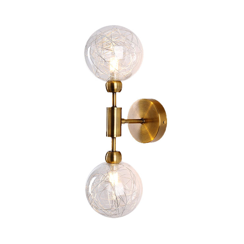 1/2-Light Bedroom Sconce Wall Light Industrial Style Black/Brass Finish Wall Lamp with Orbit Clear Glass Shade Clearhalo 'Art deco wall lights' 'Cast Iron' 'Glass' 'Industrial wall lights' 'Industrial' 'Middle century wall lights' 'Modern' 'Rustic wall lights' 'Tiffany' 'Traditional wall lights' 'Wall Lamps & Sconces' 'Wall Lights' Lighting' 331682