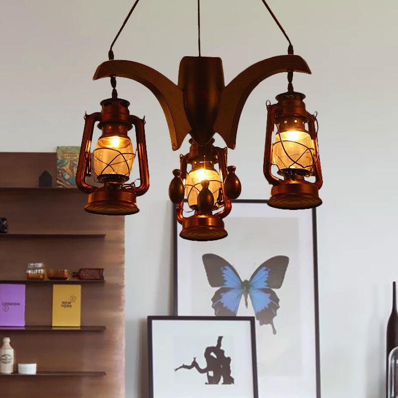 Industrial Kerosene Chandelier Lamp 3 Lights Clear Glass Hanging Ceiling Light in Dark Wood for Living Room Dark Wood Clearhalo 'Ceiling Lights' 'Chandeliers' 'Glass shade' 'Glass' 'Industrial Chandeliers' 'Industrial' 'Middle Century Chandeliers' 'Tiffany' Lighting' 337404