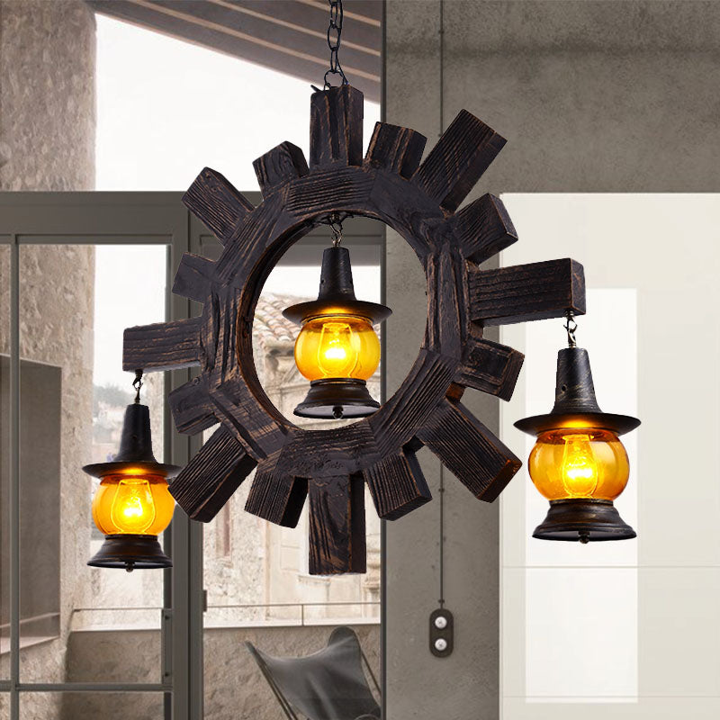 Amber Glass Black Chandelier Light Kerosene 3 Lights Factory Ceiling Hang Fixture for Living Room Clearhalo 'Ceiling Lights' 'Chandeliers' 'Glass shade' 'Glass' 'Industrial Chandeliers' 'Industrial' 'Middle Century Chandeliers' 'Tiffany' Lighting' 337410