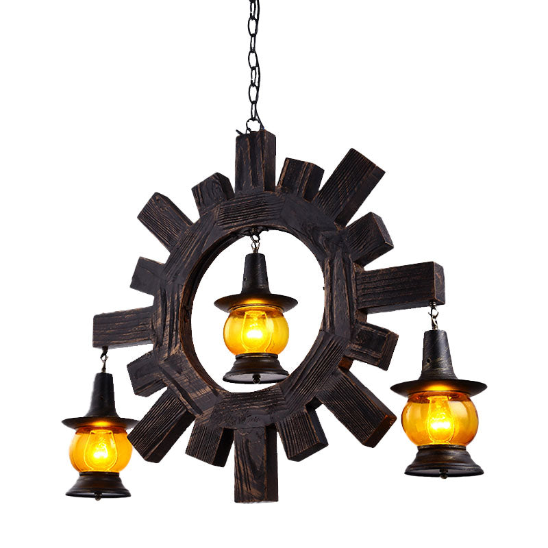 Amber Glass Black Chandelier Light Kerosene 3 Lights Factory Ceiling Hang Fixture for Living Room Clearhalo 'Ceiling Lights' 'Chandeliers' 'Glass shade' 'Glass' 'Industrial Chandeliers' 'Industrial' 'Middle Century Chandeliers' 'Tiffany' Lighting' 337412