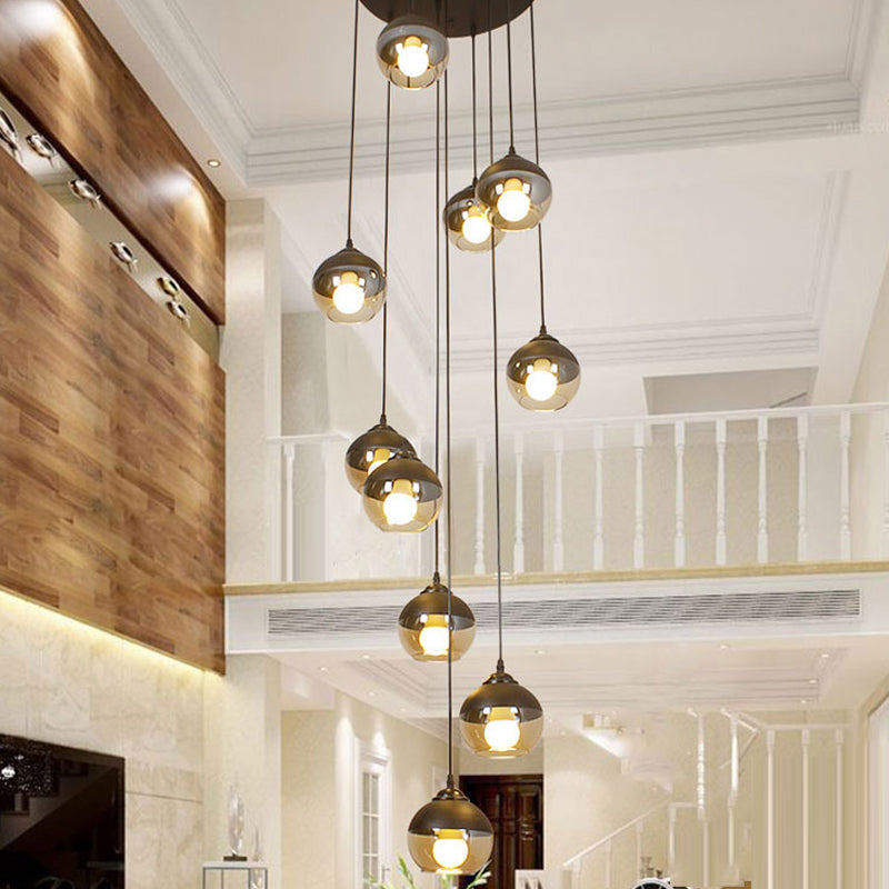 10-Light Hanging Lighting Simple Stair Multi Lamp Pendant with Globe Cognac Glass Shade in Black Clearhalo 'Ceiling Lights' 'Modern Pendants' 'Modern' 'Pendant Lights' 'Pendants' Lighting' 393514