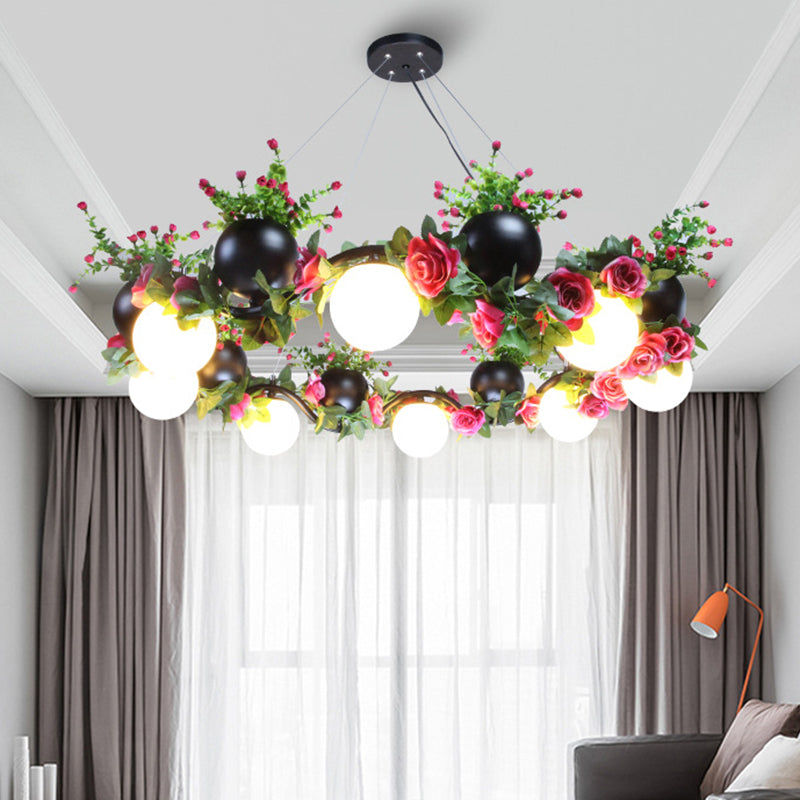 Sphere Metal Ceiling Lamp Industrial 8 Bulbs Living Room Chandelier Light in Black with Flower Decoration Black Clearhalo 'Cast Iron' 'Ceiling Lights' 'Chandeliers' 'Industrial Chandeliers' 'Industrial' 'Metal' 'Middle Century Chandeliers' 'Rustic Chandeliers' 'Tiffany' Lighting' 398242