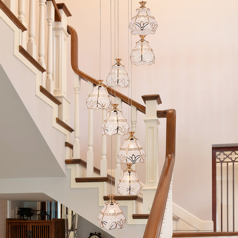 White Glass Spiral Hanging Light Contemporary 8-Light Stair Multi Lamp Pendant with Flower Shade White Clearhalo 'Ceiling Lights' 'Glass shade' 'Glass' 'Modern Pendants' 'Modern' 'Pendant Lights' 'Pendants' Lighting' 399005