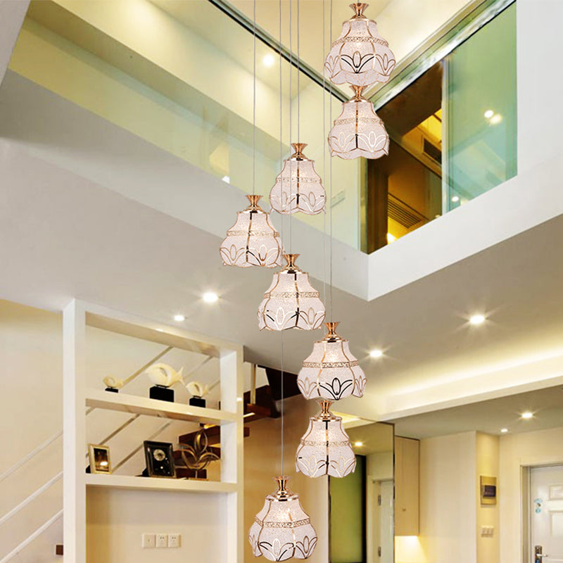 White Glass Spiral Hanging Light Contemporary 8-Light Stair Multi Lamp Pendant with Flower Shade Clearhalo 'Ceiling Lights' 'Glass shade' 'Glass' 'Modern Pendants' 'Modern' 'Pendant Lights' 'Pendants' Lighting' 399006