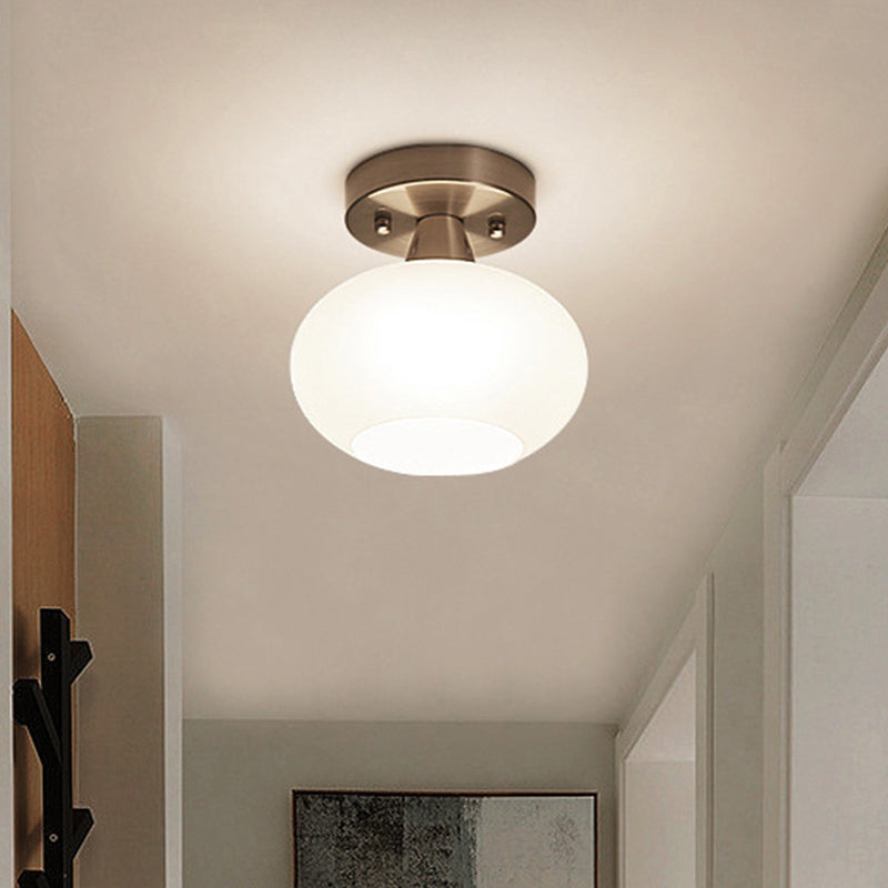 White Glass Oval Flush Mount Lantern Modernist 1 Bulb Ceiling Mounted Light for Bedroom Clearhalo 'Ceiling Lights' 'Close To Ceiling Lights' 'Close to ceiling' 'Flush mount' Lighting' 438272