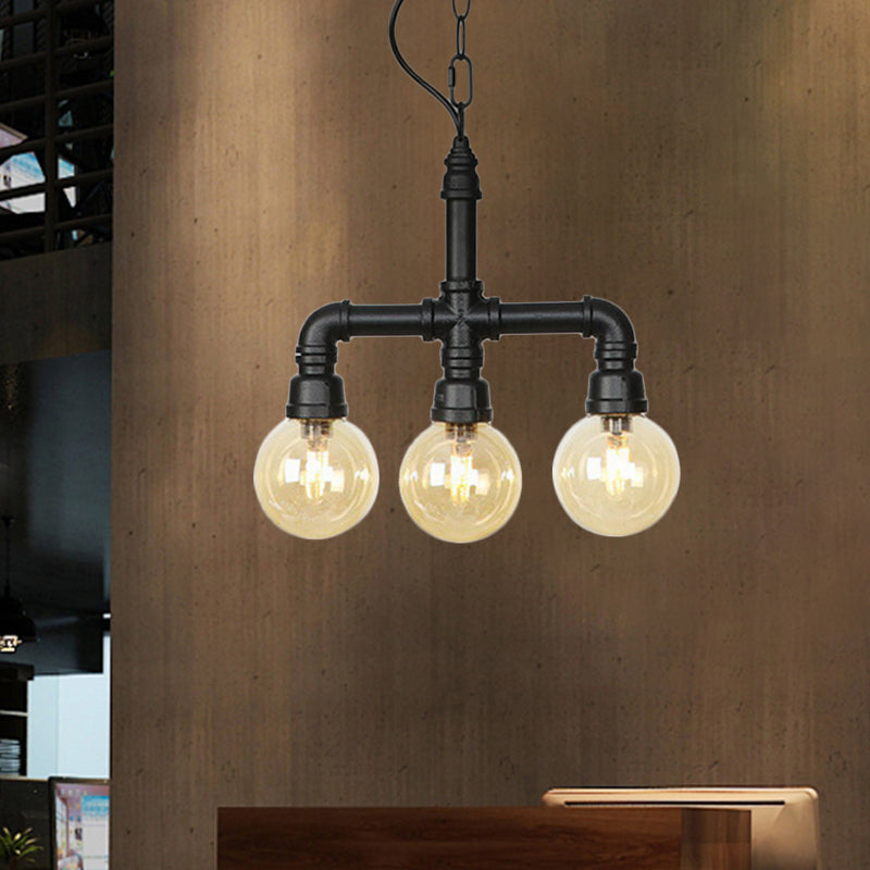 Ball Amber Glass Pendant Light Industrial 3/4 Lights Restaurant LED Ceiling Chandelier in Black with Pipe Arm 3 Black Clearhalo 'Ceiling Lights' 'Chandeliers' 'Glass shade' 'Glass' 'Industrial Chandeliers' 'Industrial' 'Middle Century Chandeliers' 'Pendant Lights' 'Tiffany' Lighting' 511155