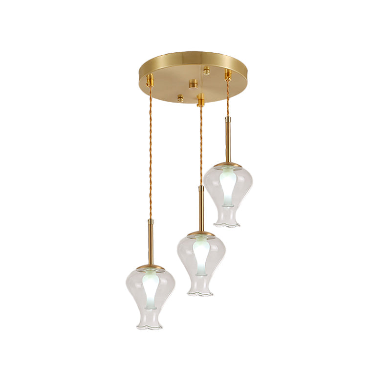 Clear Glass Vase Ceiling Light Modernism 3 Lights Multi Lamp Pendant in Brass over Dining Room Clearhalo 'Ceiling Lights' 'Chandeliers' 'Glass shade' 'Glass' 'Modern Pendants' 'Modern' 'Pendant Lights' 'Pendants' Lighting' 520108