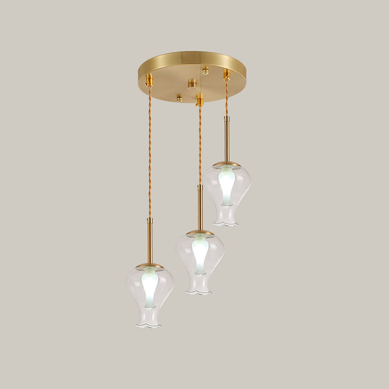 Clear Glass Vase Ceiling Light Modernism 3 Lights Multi Lamp Pendant in Brass over Dining Room Clearhalo 'Ceiling Lights' 'Chandeliers' 'Glass shade' 'Glass' 'Modern Pendants' 'Modern' 'Pendant Lights' 'Pendants' Lighting' 520109