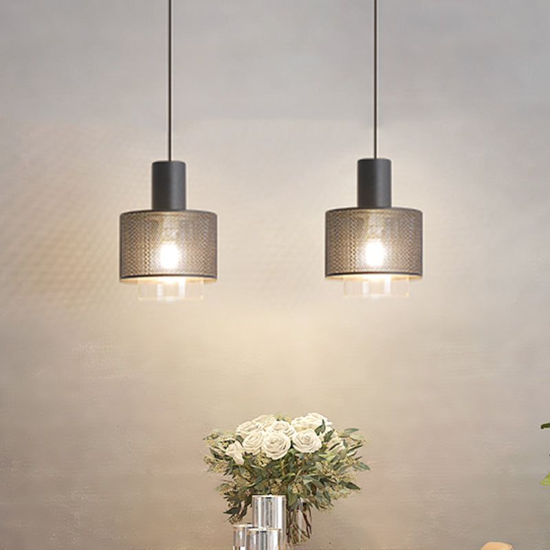 Modern Drum Mesh Pendant Lighting Iron 1 Head Bedside Hanging Ceiling Lamp in Black with Cylinder Clear Glass Shade Clearhalo 'Ceiling Lights' 'Modern Pendants' 'Modern' 'Pendant Lights' 'Pendants' Lighting' 729971