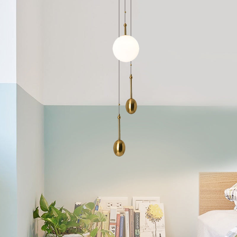 Ball Bedside Pendant Light Fixture Opal Glass 1 Light Modernist Ceiling Lamp with Dual Gold Modo Deco Clearhalo 'Ceiling Lights' 'Glass shade' 'Glass' 'Modern Pendants' 'Modern' 'Pendant Lights' 'Pendants' Lighting' 730288