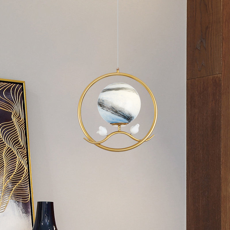 Post Modern Ring Pendant Metallic 1 Light Living Room Hanging Lamp in Gold with Planet Glass Shade and Bird Deco Clearhalo 'Ceiling Lights' 'Close To Ceiling Lights' 'Glass shade' 'Glass' 'Modern Pendants' 'Modern' 'Pendant Lights' 'Pendants' Lighting' 730490