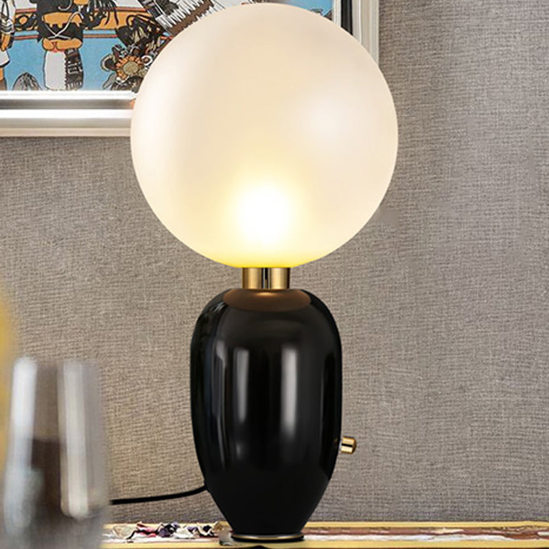 Capsule Table Lighting Modern Metallic 1 Light Living Room LED Desk Lamp in Black/Gold with Orb White Glass Shade Black Clearhalo 'Lamps' 'Table Lamps' Lighting' 730714
