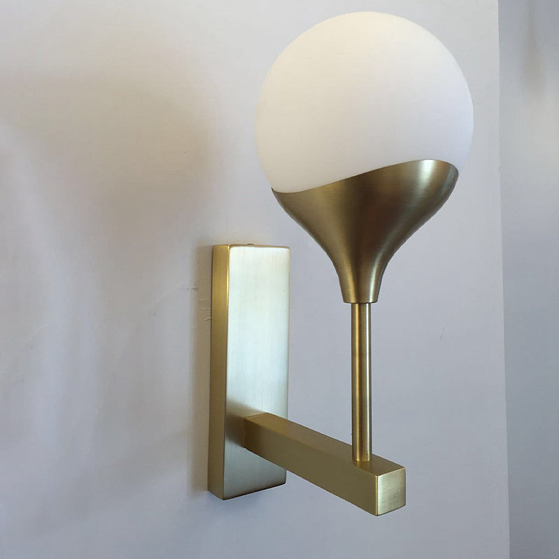 1 Bulb Bedroom Wall Light Minimal Brass Finish Wall Sconce with Globe Cream Glass Shade Brass Clearhalo 'Cast Iron' 'Glass' 'Industrial' 'Modern wall lights' 'Modern' 'Tiffany' 'Traditional wall lights' 'Wall Lamps & Sconces' 'Wall Lights' Lighting' 734541