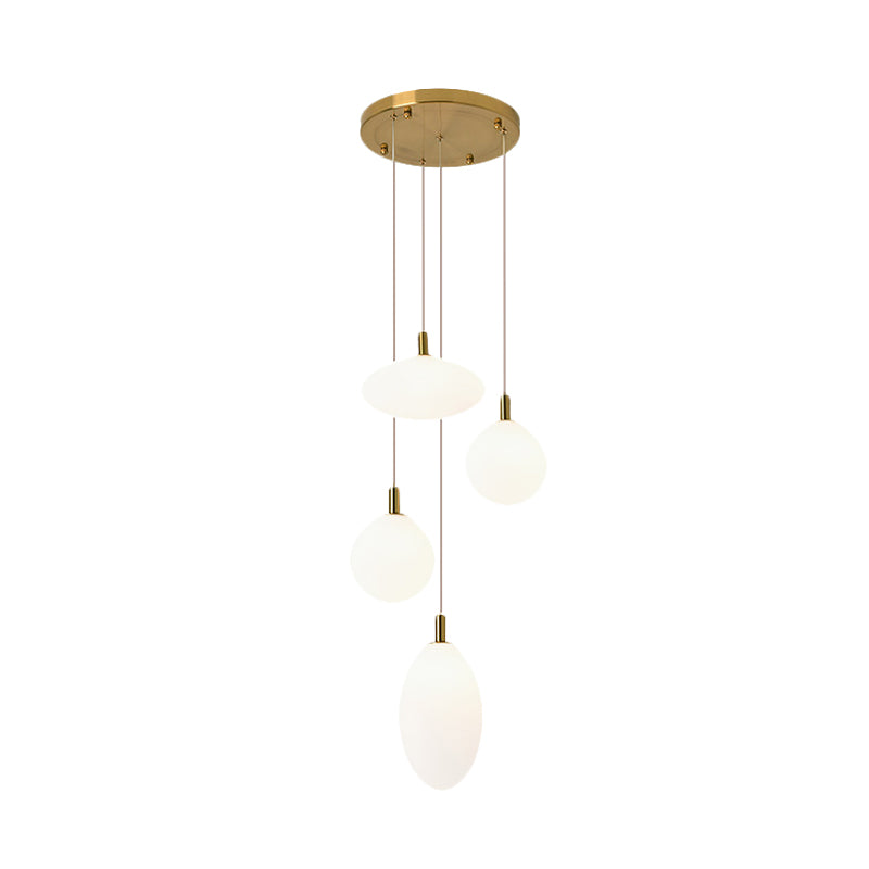 Gold/Black Ball and Oval Cluster Pendant Minimalism 4 Lights Cream Glass Hanging Lamp with Round Canopy Clearhalo 'Ceiling Lights' 'Close To Ceiling Lights' 'Glass shade' 'Glass' 'Modern Pendants' 'Modern' 'Pendant Lights' 'Pendants' Lighting' 735547