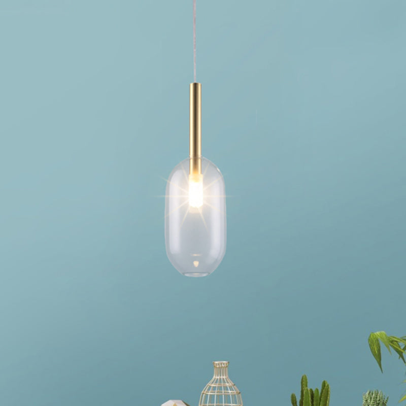 1-Light Living Room Pendant Simple Brass LED Ceiling Lamp with Capsule Clear Glass Shade Clearhalo 'Ceiling Lights' 'Glass shade' 'Glass' 'Modern Pendants' 'Modern' 'Pendant Lights' 'Pendants' Lighting' 736953