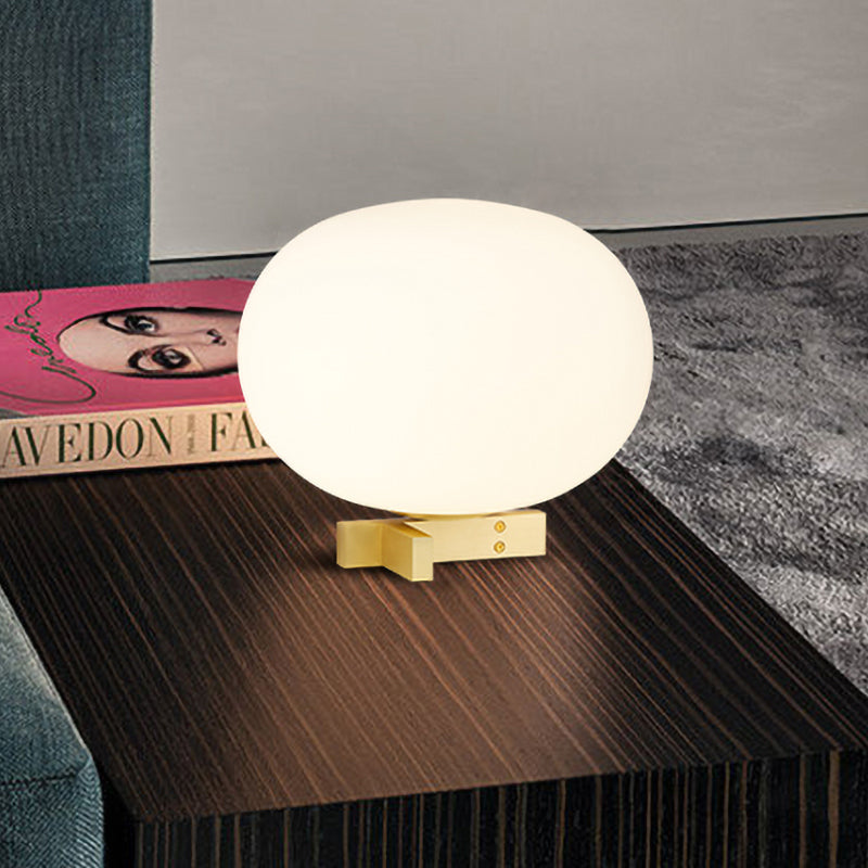 Cream Glass Egg-Shape Night Light Postmodern 1 Light Gold Finish Nightstand Lamp for Bedside Gold Clearhalo 'Lamps' 'Table Lamps' Lighting' 737127