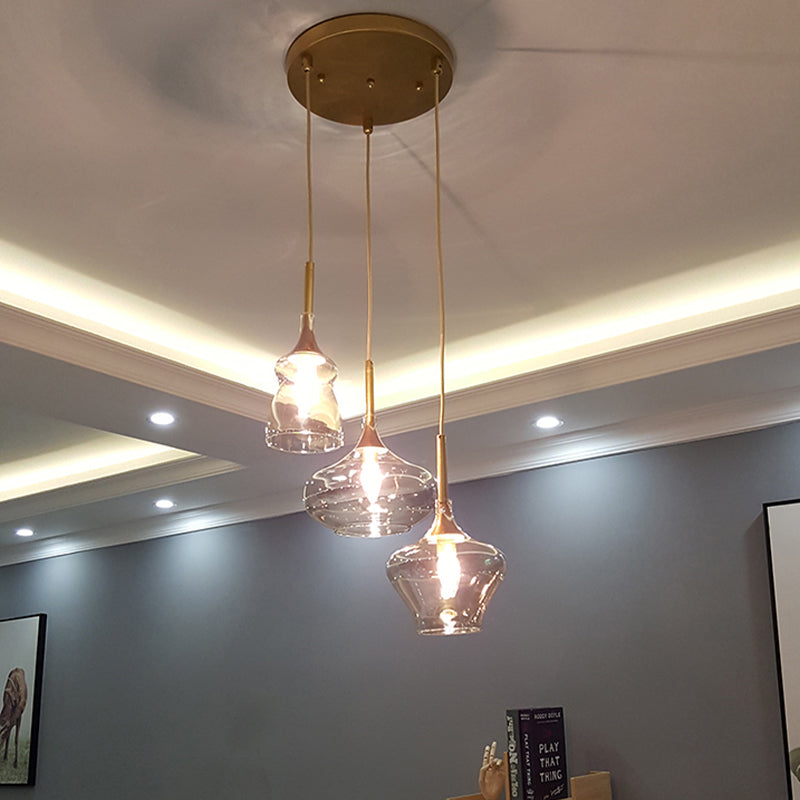 Clear/Cognac Glass Wavy Multi Ceiling Light Modernism 3 Bulbs Gold Hanging Pendant Lamp Clear Clearhalo 'Ceiling Lights' 'Glass shade' 'Glass' 'Modern Pendants' 'Modern' 'Pendant Lights' 'Pendants' Lighting' 737177