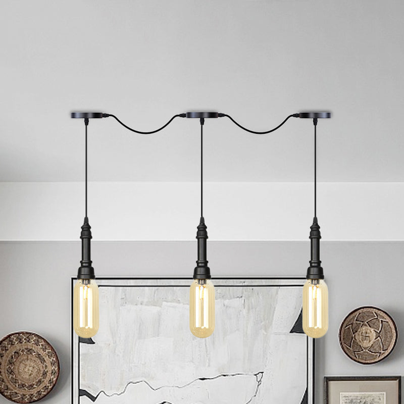 3/5/7 Lights Capsule Multi Light Chandelier Industrial Black Finish Amber Glass Tandem LED Hanging Ceiling Lamp 3 Black Clearhalo 'Ceiling Lights' 'Glass shade' 'Glass' 'Industrial Pendants' 'Industrial' 'Middle Century Pendants' 'Pendant Lights' 'Pendants' 'Tiffany' Lighting' 739052