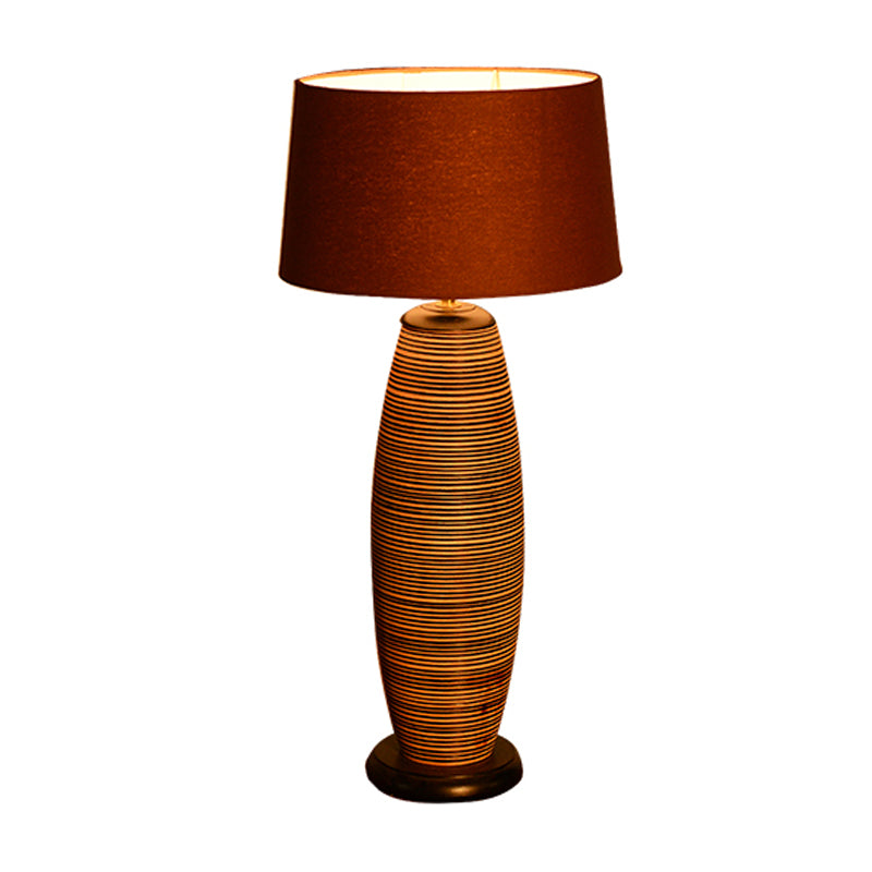 Coffee Cocoon Shaped Night Lighting Asia 1 Head Wood Night Table Lamp with Drum Brown Fabric Shade Clearhalo 'Lamps' 'Table Lamps' Lighting' 762810