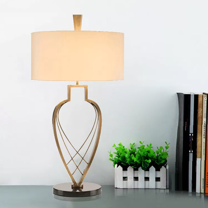 Modern Drum Night Table Light Fabric 1 Bulb Study Room Reading Lamp in Beige with Gold Urn Frame Base Clearhalo 'Lamps' 'Table Lamps' Lighting' 762920