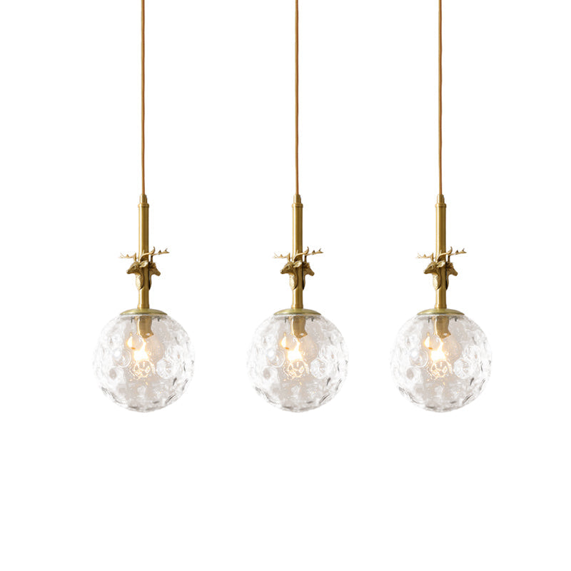 3 Lights Ball Multi Light Pendant Traditional Brass Finish Clear Dimpled Glass Ceiling Lamp with Antler Deco Clearhalo 'Ceiling Lights' 'Glass shade' 'Glass' 'Pendant Lights' 'Pendants' Lighting' 782223