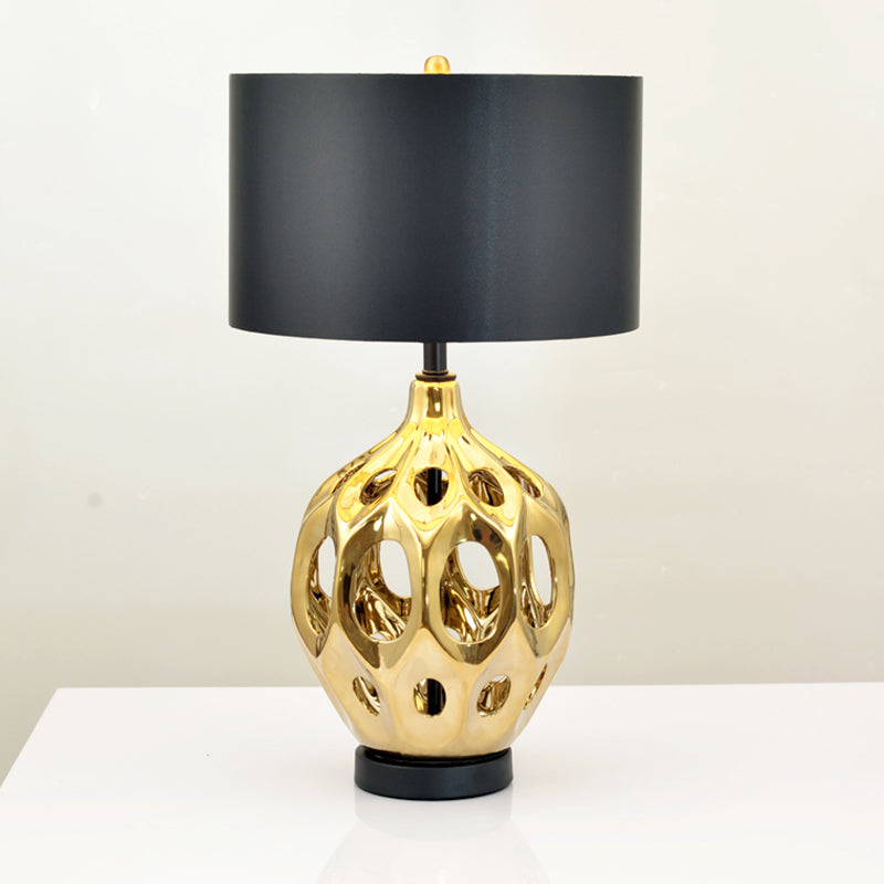Ceramic Hollowed Out Jar Nightstand Lamp Retro 1-Bulb Bedroom Table Lighting in Gold/Rose Gold with Black Drum Shade Gold Clearhalo 'Lamps' 'Table Lamps' Lighting' 785339