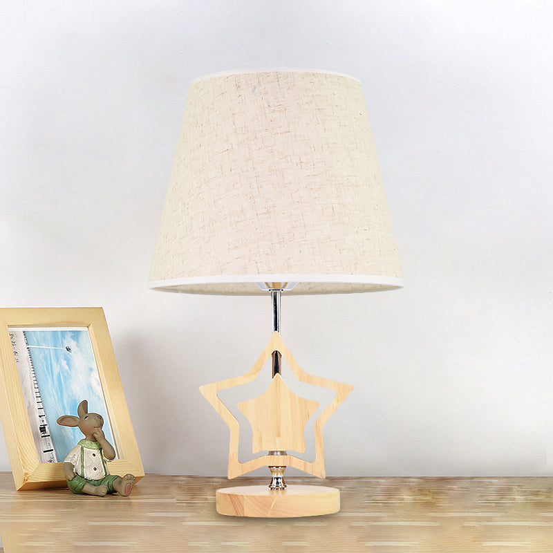 Wood Star Nightstand Lamp Modern 1 Light Table Light with Barrel Fabric Shade in Beige Wood Clearhalo 'Lamps' 'Table Lamps' Lighting' 813488