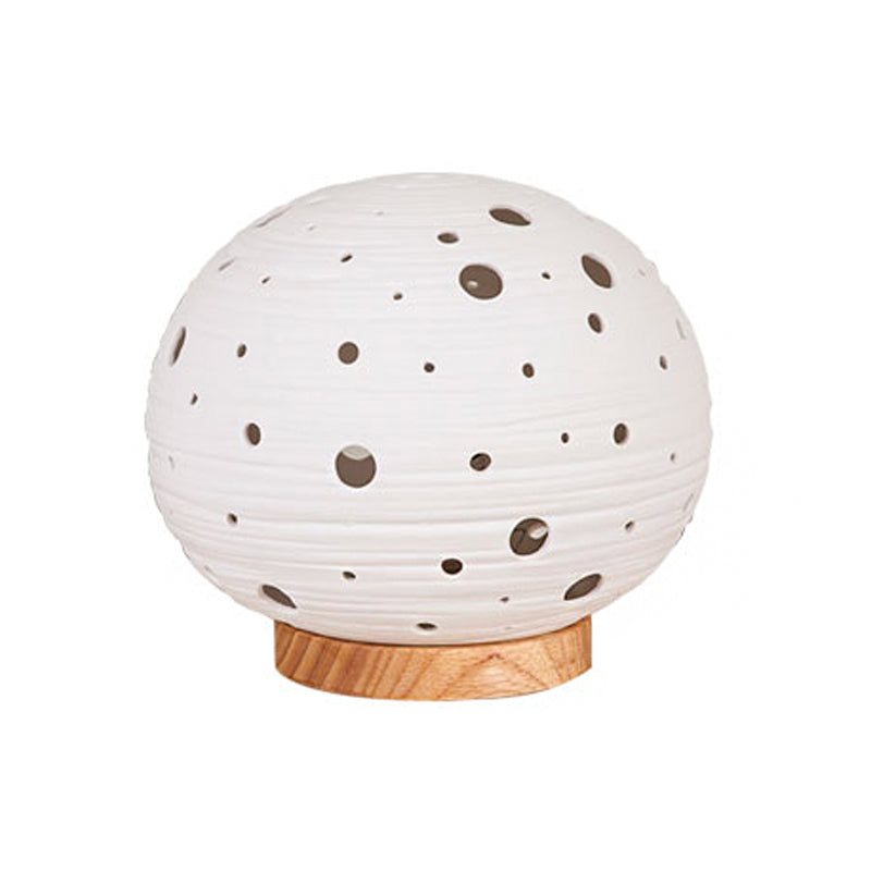 1 Head Bedroom Night Table Light Contemporary White Desk Lamp with Laser-Cut Ball Ceramics Shade Clearhalo 'Lamps' 'Table Lamps' Lighting' 813573