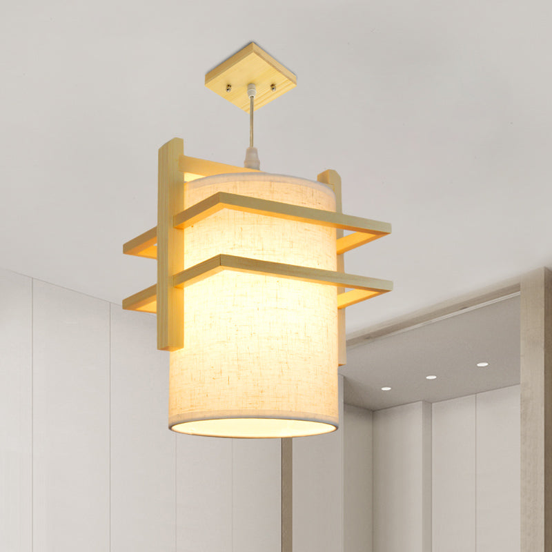 Fabric Cylindrical Hanging Lamp Kit Asian Style 1 Head Beige Ceiling Suspension Light with Wood Shelf Beige Clearhalo 'Ceiling Lights' 'Pendant Lights' 'Pendants' Lighting' 863281_145d66b5-0b34-40d8-b65b-e3c004e38c27