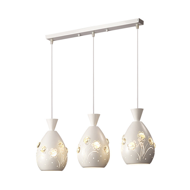 White Cone Multiple Hanging Light Modern 3 Lights Iron Pendulum Lamp with Laser-Cut Floral Design Clearhalo 'Ceiling Lights' 'Modern Pendants' 'Modern' 'Pendant Lights' 'Pendants' Lighting' 897558