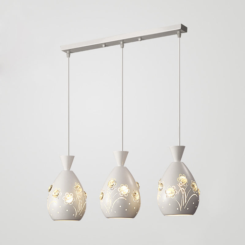 White Cone Multiple Hanging Light Modern 3 Lights Iron Pendulum Lamp with Laser-Cut Floral Design Clearhalo 'Ceiling Lights' 'Modern Pendants' 'Modern' 'Pendant Lights' 'Pendants' Lighting' 897559