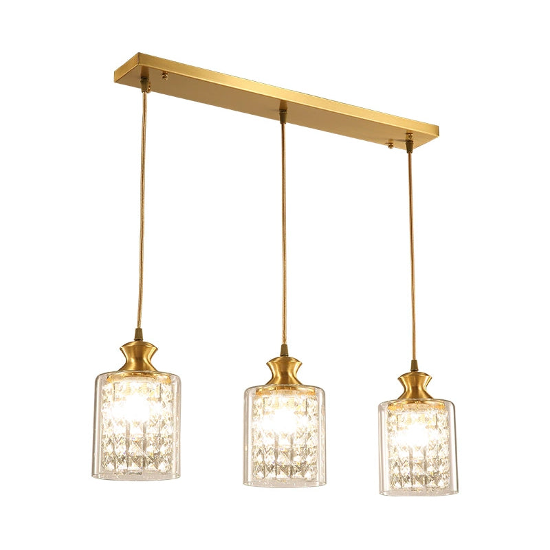 Cylinder Faceted Crystal Multi-Light Pendant Modernist 3 Heads Gold Hanging Lamp with Clear Glass Shade Clearhalo 'Ceiling Lights' 'Close To Ceiling Lights' 'Glass shade' 'Glass' 'Modern Pendants' 'Modern' 'Pendant Lights' 'Pendants' Lighting' 916248