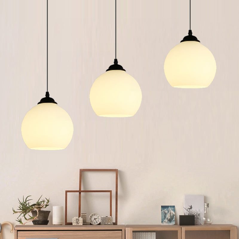 3-Light Spherical Cluster Hanging Lamp Industrial Black Opal Glass Pendant Lighting with Linear Canopy Clearhalo 'Art Deco Pendants' 'Cast Iron' 'Ceiling Lights' 'Ceramic' 'Crystal' 'Industrial Pendants' 'Industrial' 'Metal' 'Middle Century Pendants' 'Pendant Lights' 'Pendants' 'Tiffany' Lighting' 95493